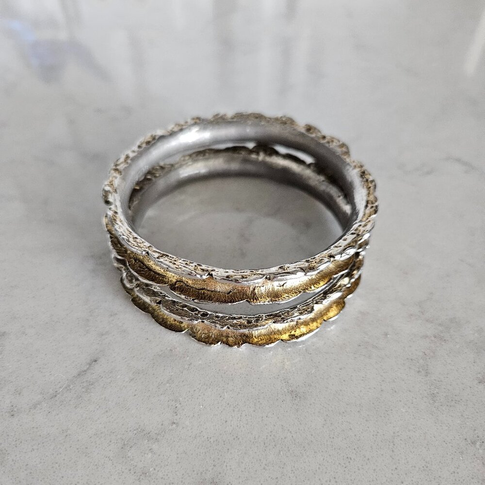 PAIR OF ZENTALL SCALLOPED-EDGE HEAVY METAL BANGLE BRACELETS
